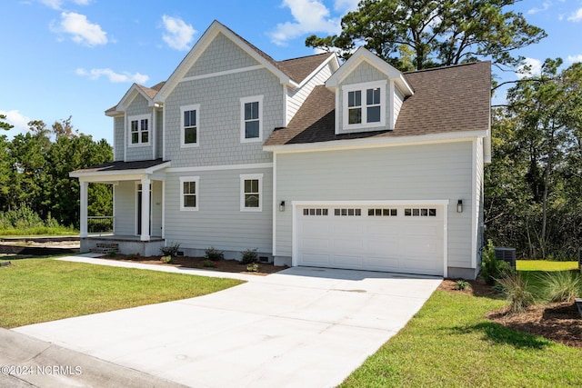 view of front of property with a porch, an attached garage, concrete driveway, crawl space, and a front yard