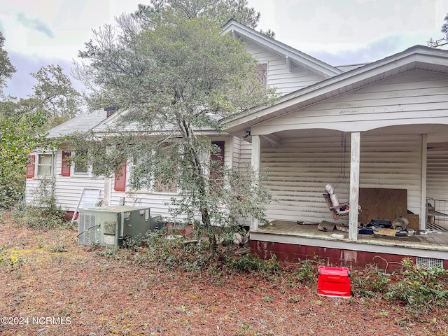 view of property exterior with central air condition unit