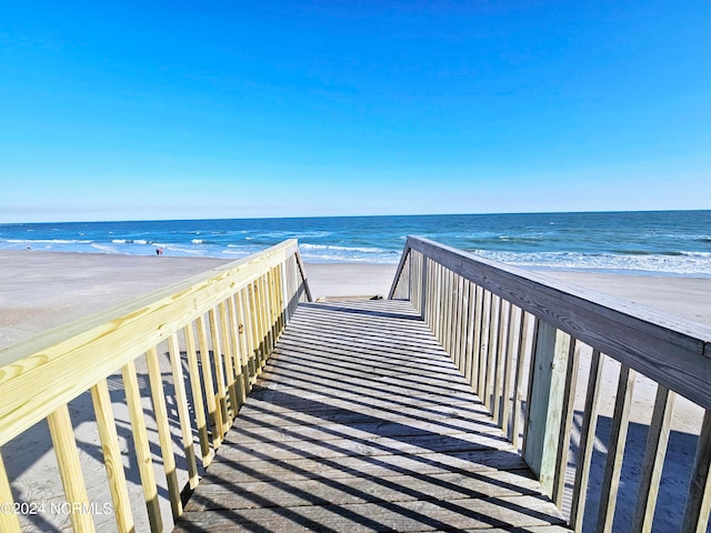 view of nearby features with a water view and a view of the beach