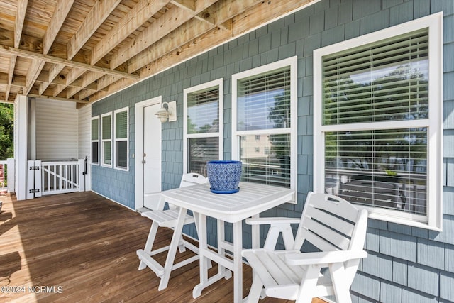 wooden deck featuring a porch