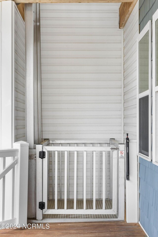 room details featuring stainless steel fridge and water heater