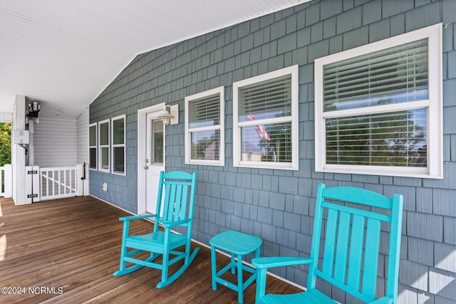 wooden deck featuring a porch