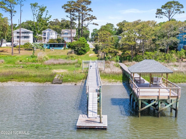 dock area with a water view