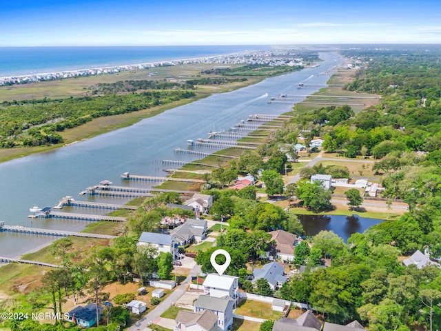 drone / aerial view with a water view