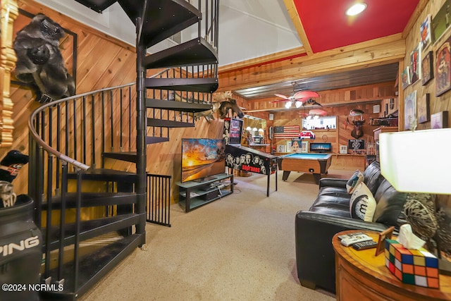 living room with wooden walls, billiards, and ceiling fan