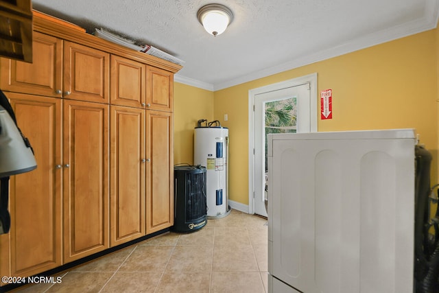 clothes washing area with a textured ceiling, light tile flooring, electric water heater, and crown molding