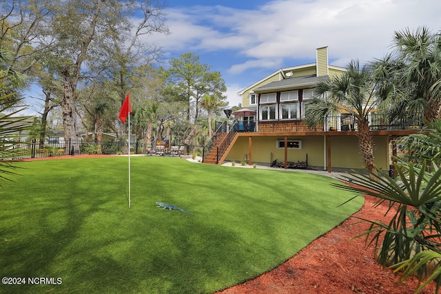 view of yard featuring a deck