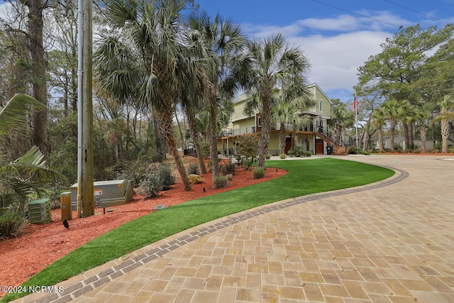 exterior space with a front yard