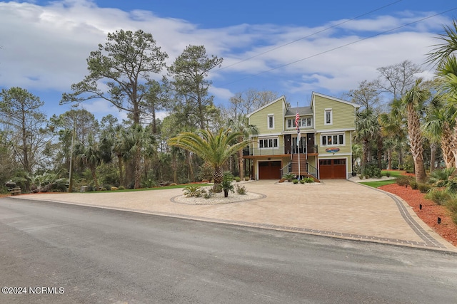 view of front of property with a garage