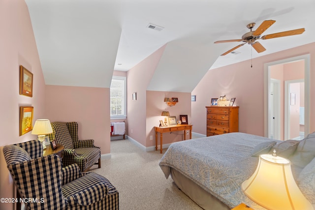 carpeted bedroom featuring lofted ceiling and ceiling fan