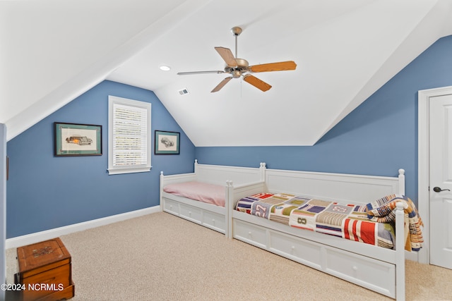 bedroom featuring light carpet, ceiling fan, and lofted ceiling