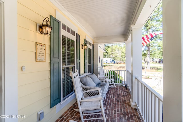 balcony featuring a porch