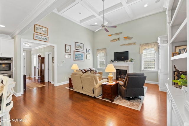 living room featuring coffered ceiling, beam ceiling, dark hardwood / wood-style floors, and ceiling fan