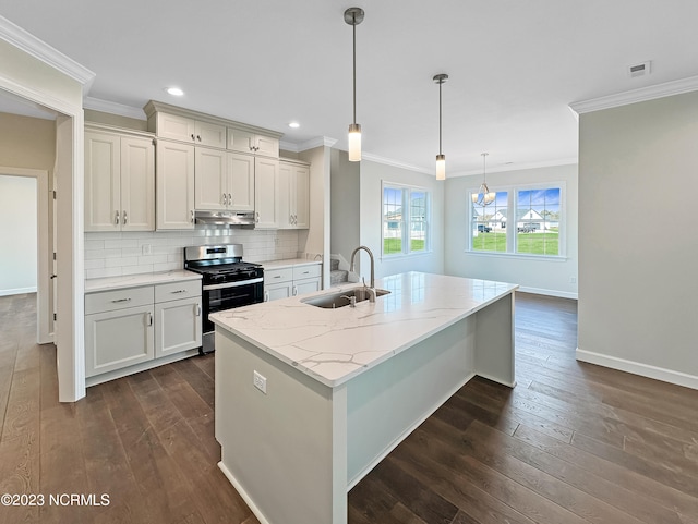 kitchen with decorative light fixtures, stainless steel range with gas cooktop, dark wood-type flooring, and sink