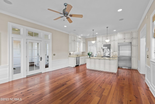 kitchen featuring white cabinets, ceiling fan, stainless steel appliances, dark hardwood / wood-style floors, and french doors