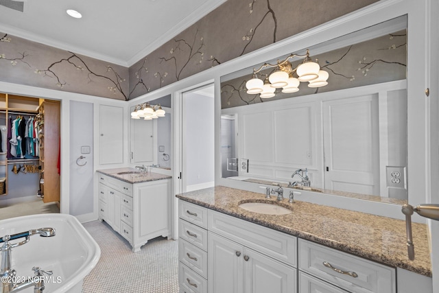 bathroom with a bath, double sink vanity, tile flooring, and crown molding