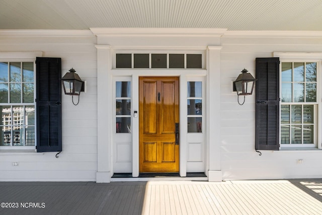 doorway to property with a porch