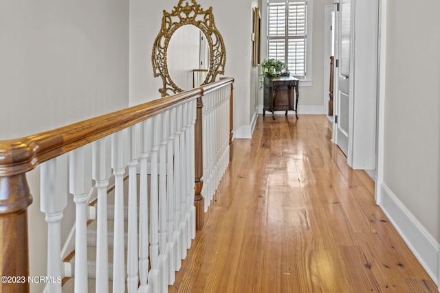 hallway with light wood-type flooring