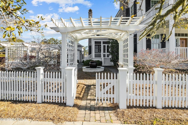 view of front of property with a pergola