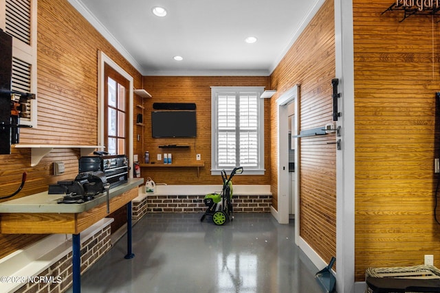 office area featuring wood walls