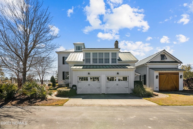 view of front of property with a garage