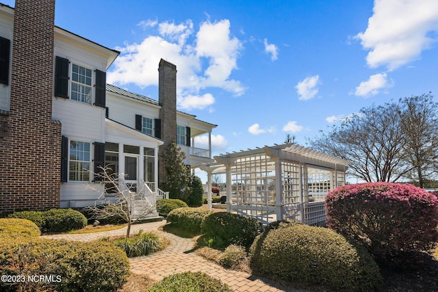 exterior space with a pergola