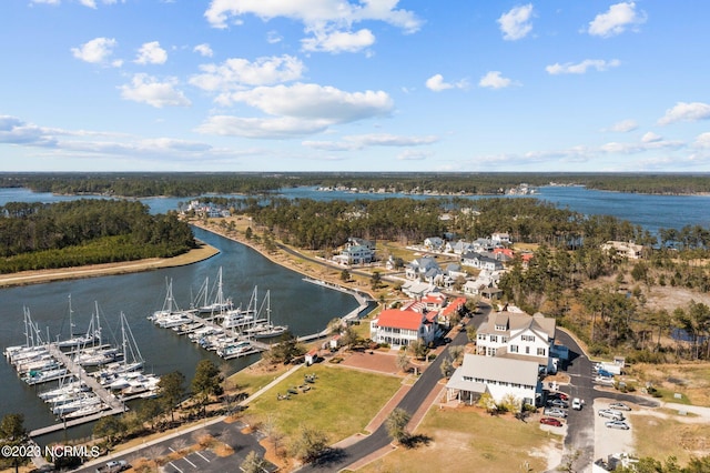 birds eye view of property featuring a water view