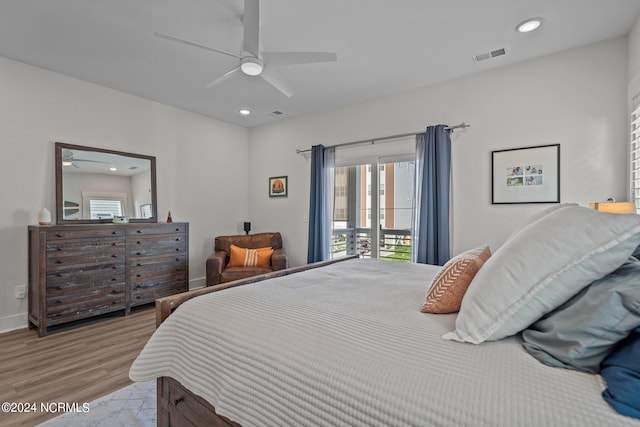 bedroom featuring ceiling fan, access to outside, and light hardwood / wood-style floors