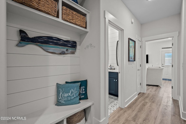 mudroom featuring light wood-type flooring