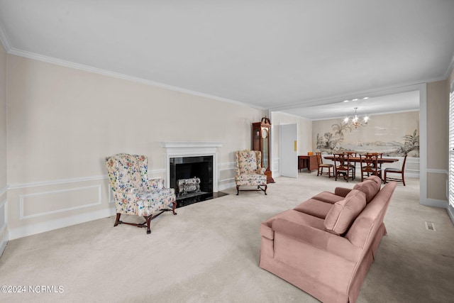 carpeted living room featuring crown molding, a fireplace, and a chandelier