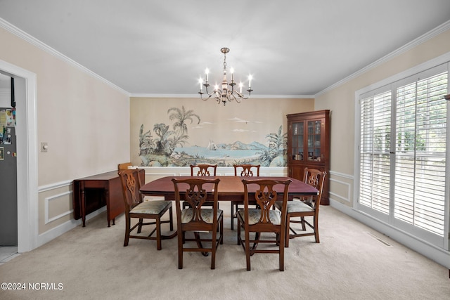 carpeted dining area featuring an inviting chandelier and ornamental molding