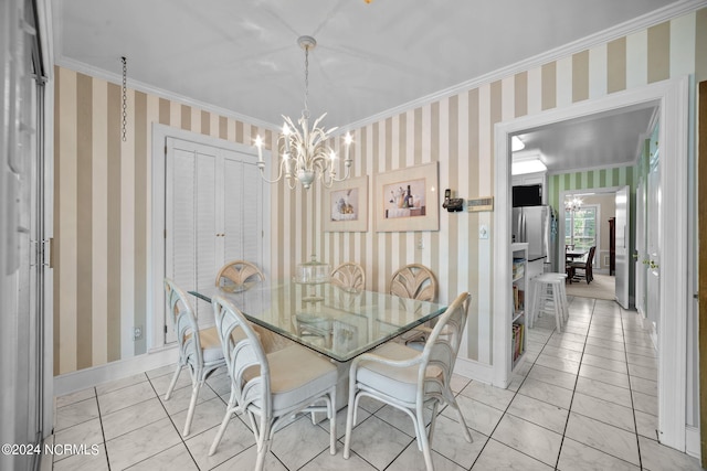 tiled dining room with ornamental molding and a chandelier