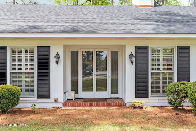 entrance to property featuring french doors