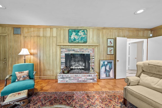 living room featuring light hardwood / wood-style floors and a fireplace