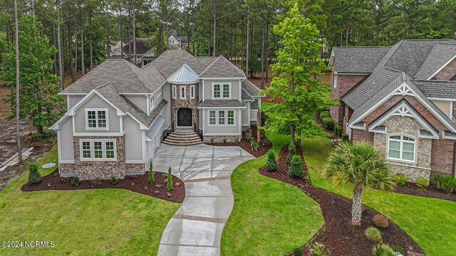 view of front of home with a front lawn