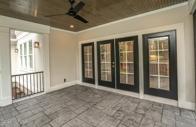 view of patio featuring ceiling fan