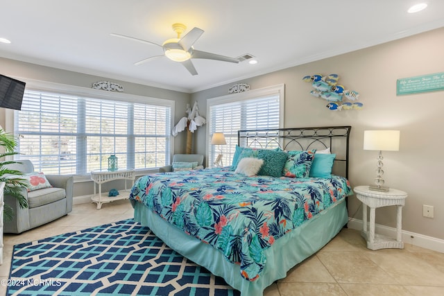 tiled bedroom featuring crown molding and ceiling fan