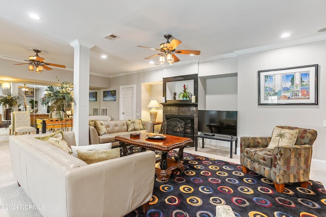 carpeted living room with ceiling fan and ornamental molding