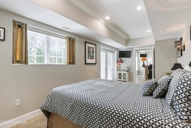 bedroom with crown molding