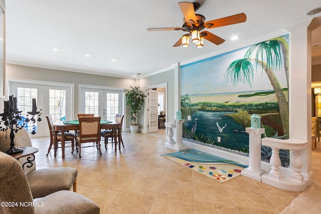 living room with ceiling fan, crown molding, light tile floors, and french doors