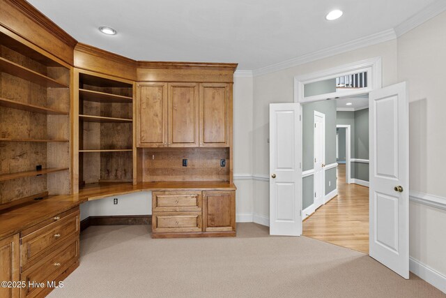 living room featuring ornamental molding and light wood-type flooring