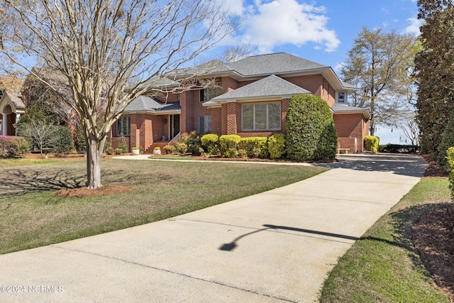 view of front of house with a front lawn