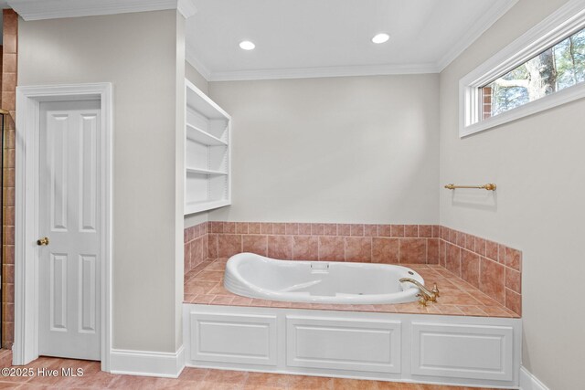 carpeted bedroom with crown molding and a tray ceiling