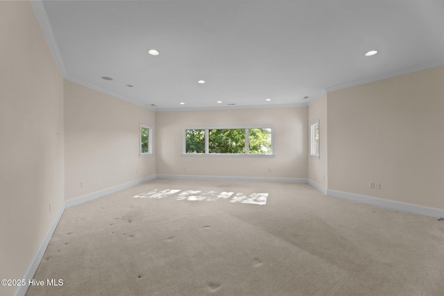 carpeted empty room with ornamental molding