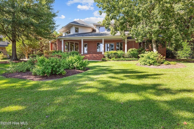 view of front of house featuring a front lawn and a porch