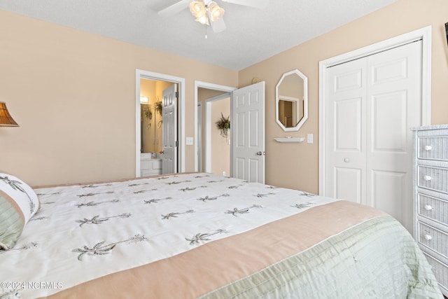 bedroom featuring a ceiling fan, a closet, and connected bathroom