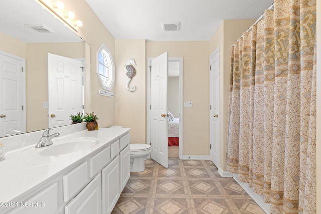 full bath featuring toilet, ensuite bath, vanity, and visible vents