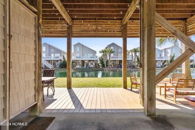 doorway to outside featuring a water view