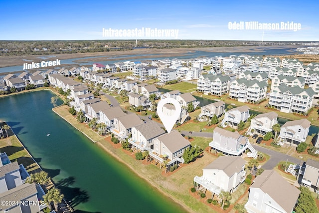 aerial view with a water view and a residential view