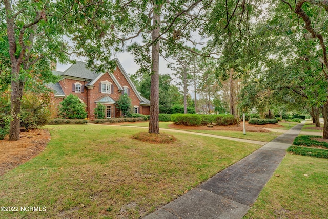 view of front of house with a front lawn